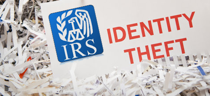 IRS logo and text reading IDENTITY THEFT on shredded paper.