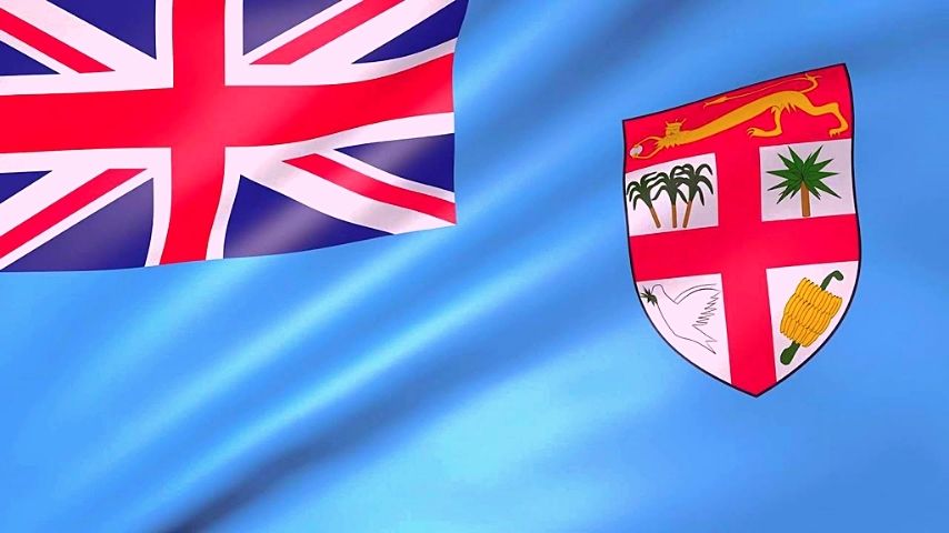 The Union Jack and the Fijian coat of arms on a blue background.