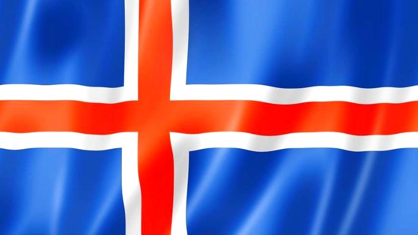 Flag of Iceland with a blue field and a red cross outlined in white.