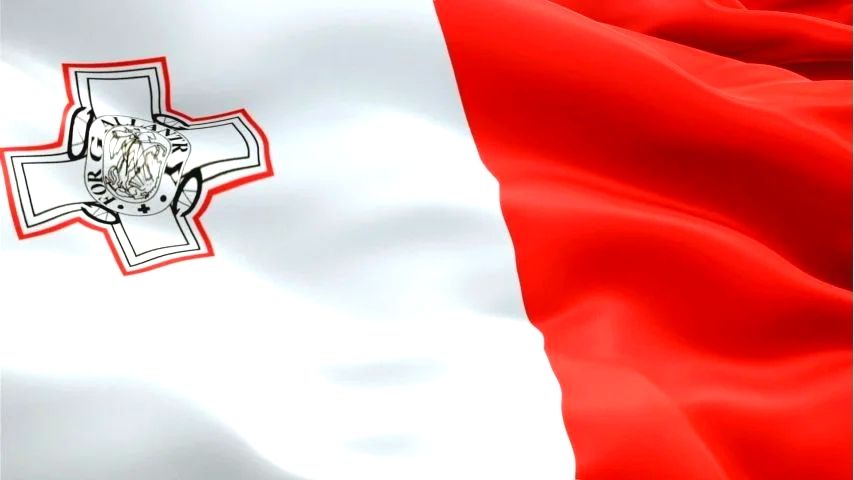 Waving flag of Malta with red and white sections and a George Cross emblem.
