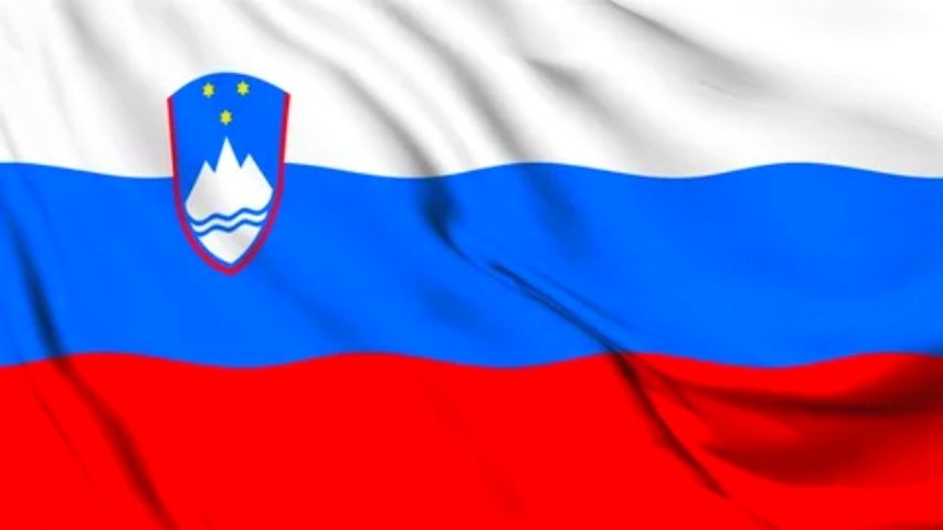 Flag of Slovenia with white, blue, and red stripes and a coat of arms.